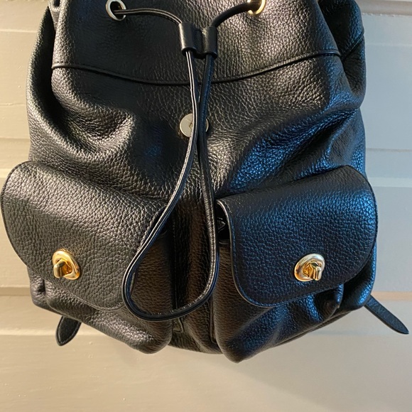 classic black leather backpack Handcrafted 16 Inch Genuine Leather — Classy Leather Bags SIZE:ONE SIZE two external side pockets variantID_29a931d9-a6c3-43dc-8fbe-a39f508b0fda 1970s Fishing Reels -